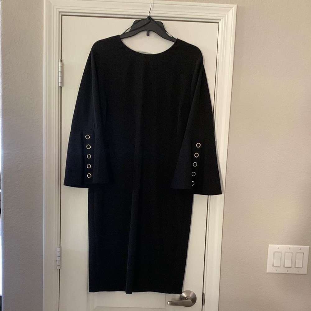 Elegant Black Dress with Button Detail